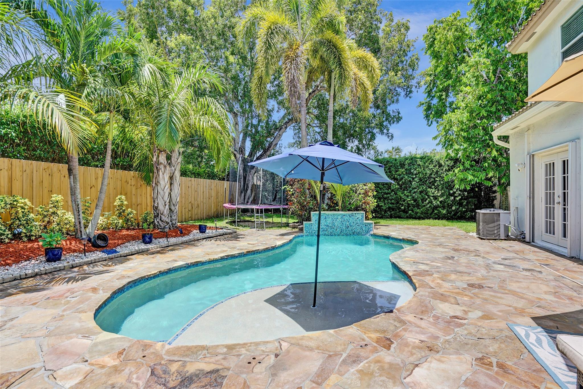 This home is the kind of place where you sip your coffee by your renovated saltwater pool, enjoy a great-sized yard, & stroll over to the neighborhood playground that’s so close. Inside, you’ll find a layout that just works: primary downstairs, spacious living areas, & loft perfect for office, playroom, or workout space. It’s not just about good vibes — this home comes ready for real life with 2024 AC, newer appliances, full hurricane protection, & sits on a quiet street. Everything’s already done for you. Just move in, unpack, & start enjoying. Located in a not-so-hidden gem, Rock Creek — with trails, lakes, parks, & A-rated schools that make people want to move here. The kind of neighborhood where pool parties, lazy Sundays, & playground runs all fit into real life.