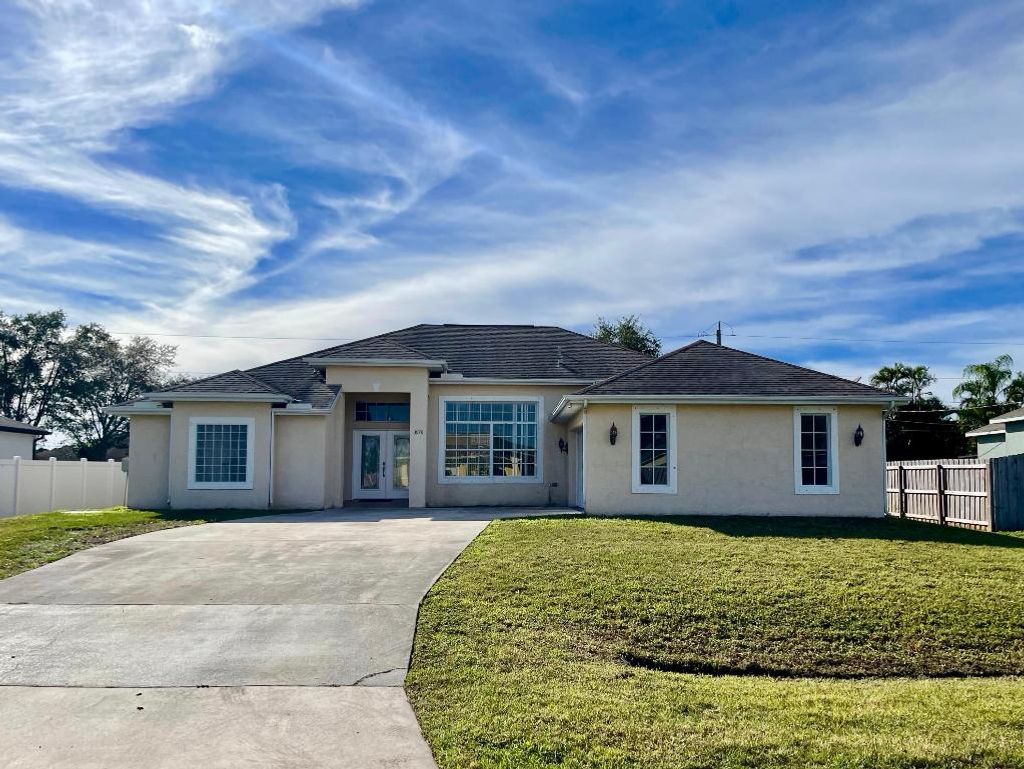 Photo of 3978 SW Laffite Street, Port Saint Lucie, FL 34953 (MLS # R10943167)