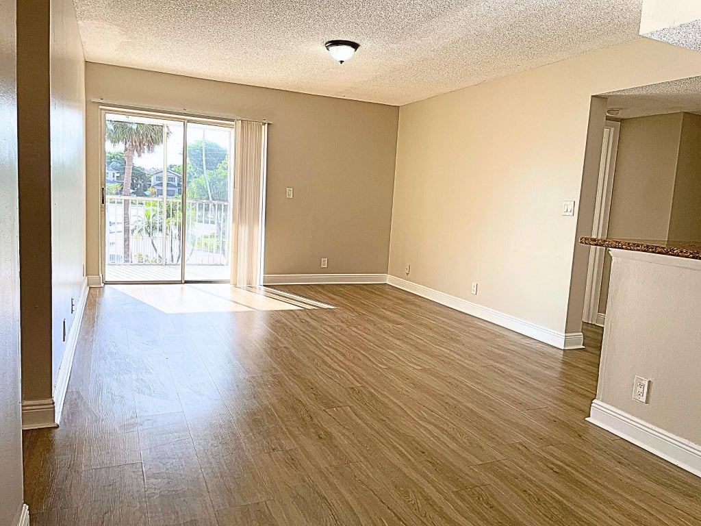 Photo of 5686 ROCK ISLAND Road #124, Tamarac, FL 33319 (MLS # B26087902)