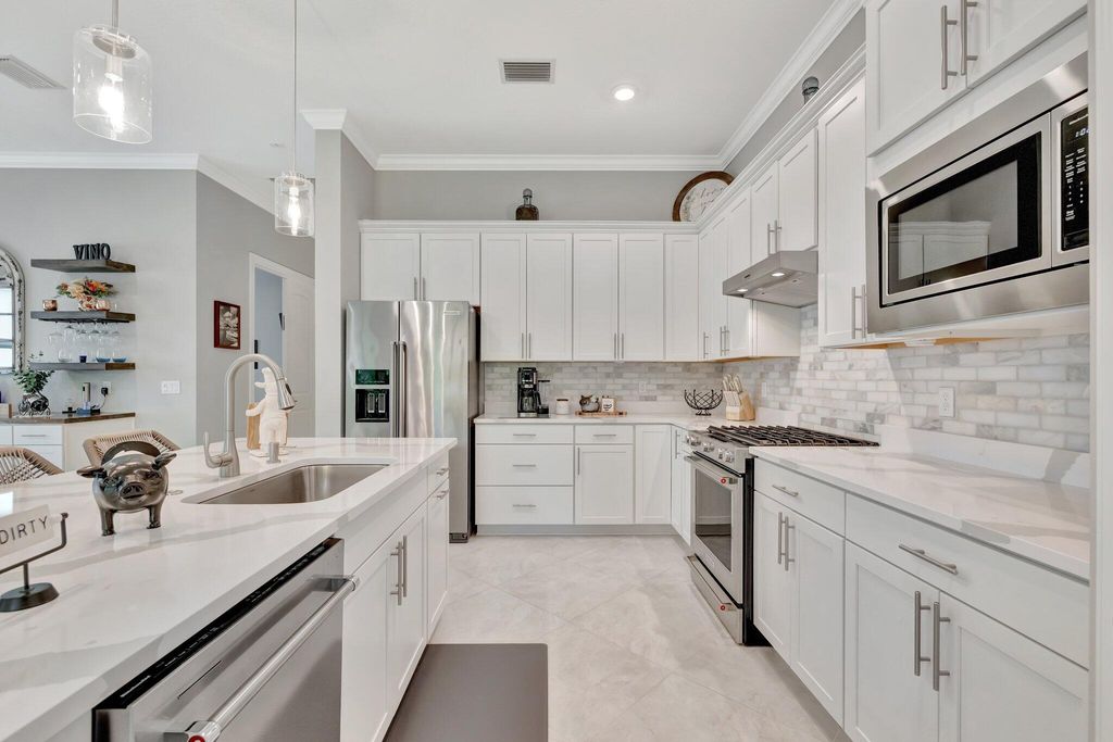 Photo of 572 SE Villandry Way, Port Saint Lucie, FL 34984 (MLS # R11103965)