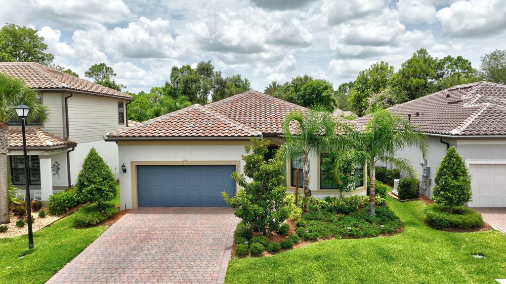 Photo of 572 SE Villandry Way, Port Saint Lucie, FL 34984 (MLS # R11103965)