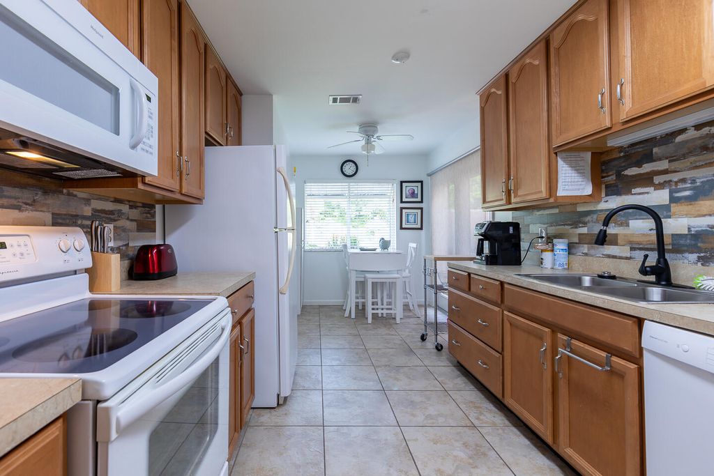 Photo of 3303 SE Sandpiper Circle, Port Saint Lucie, FL 34952 (MLS # R11111369)