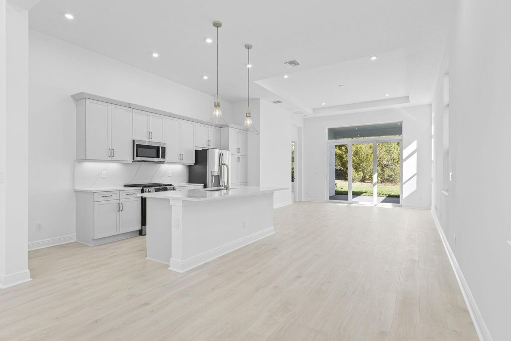 Photo of 140 SE Via Tirso, Port Saint Lucie, FL 34952 (MLS # R11157364)