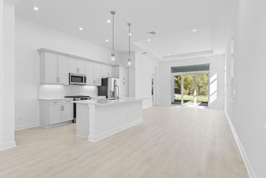 MOVE-IN READY! Enjoy serene lakefront living in the only Allison home with uninterrupted lake views and no homes in front. This home offers a 4' owner's suite and lanai extension, a 5' privacy wall pre-plumbed for an outdoor kitchen, light laminate flooring throughout, white cabinetry with brushed nickel hardware, and a flex room perfect for dining or a private den. Low HOA Fees & No CDD!