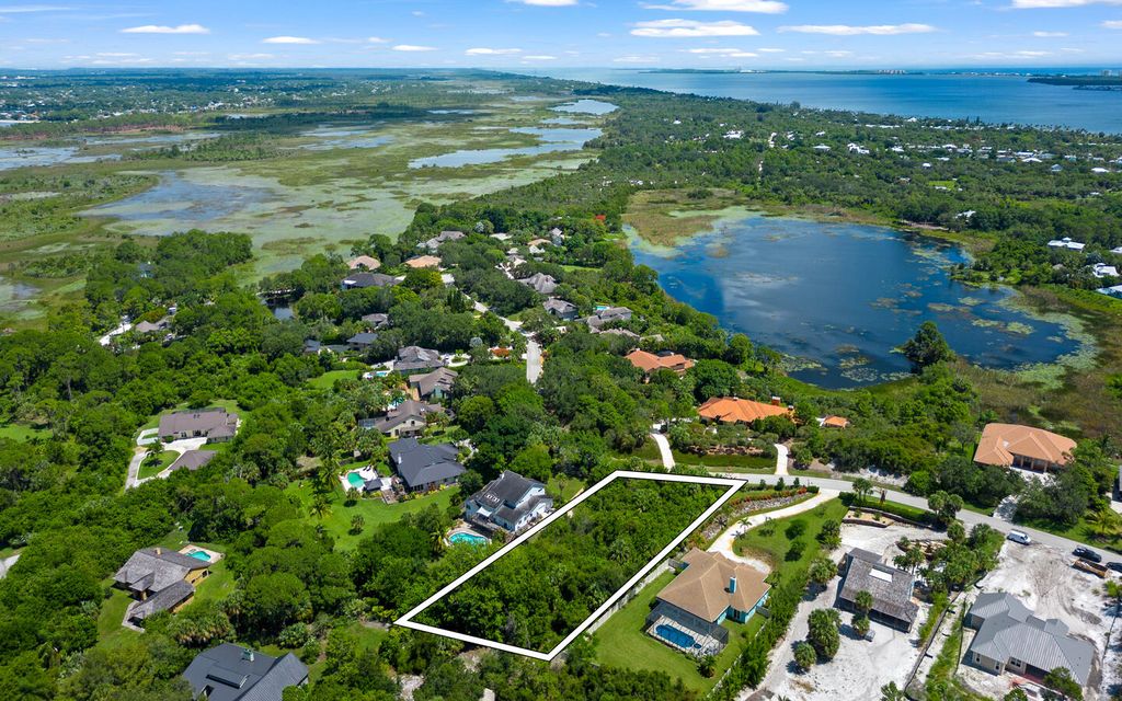 Photo of 3850 NE Sugarhill Avenue, Jensen Beach, FL 34957 (MLS # R10903198)