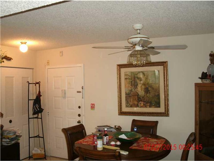 Lovingly maintained by current owner, tile throughout. Two equal size masters bedrooms with washer/dryer inside the unit.  Fabulous closet space plus extra storage room. Resort like community with Billiards, Tennis, Sauna, heated Pool, Exercise room. Main tenance also includes Basic cable,HBO, Water, and Insurance.  Association requires minimum 40K income can be combined, 9 months of maintenance in escrow.