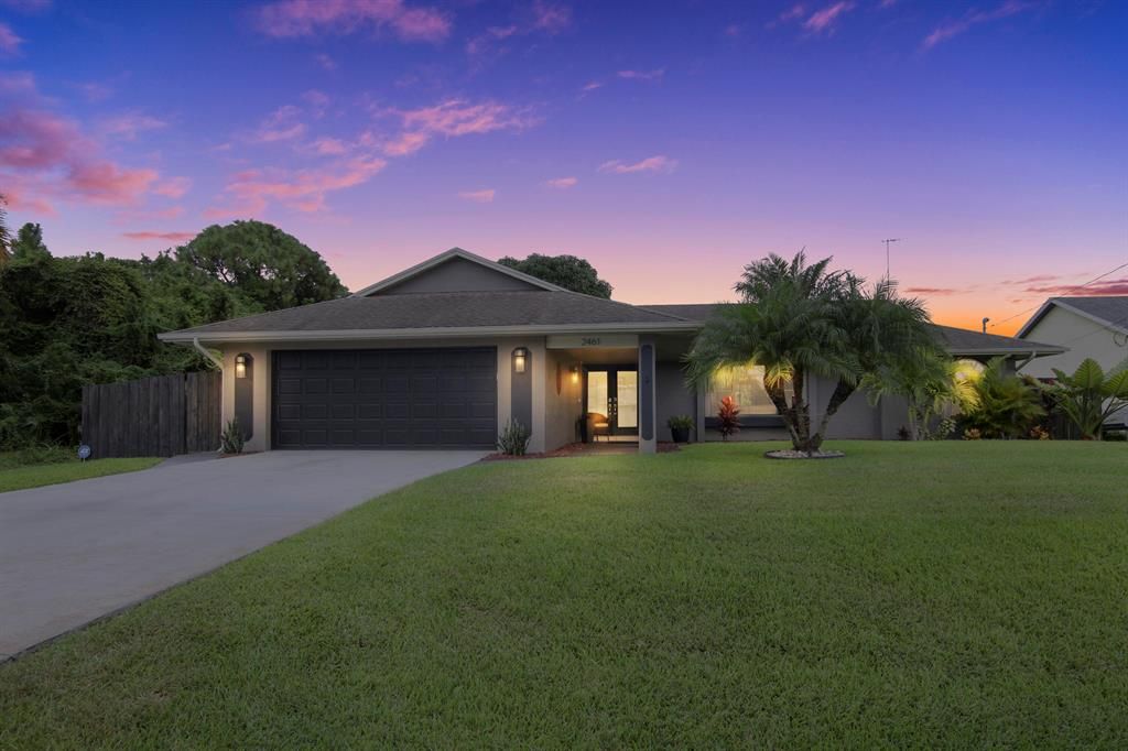 Photo of 2461 SW Chestnut Lane, Port Saint Lucie, FL 34953 (MLS # R10757034)
