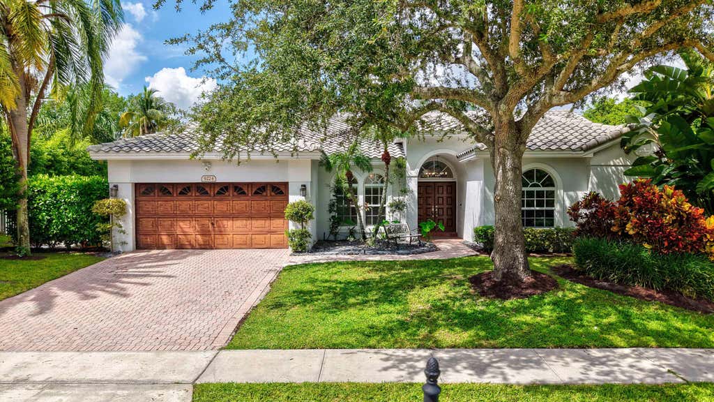 Photo of 9224 LAKE SERENA Drive, Boca Raton, FL 33496 (MLS # B26069130)