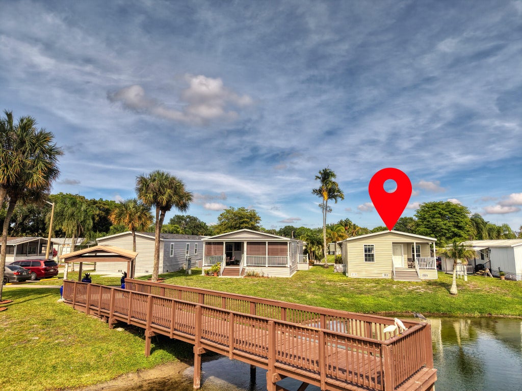 Photo of 164 Plantation Boulevard, Lake Worth, FL 33467 (MLS # B26023052)
