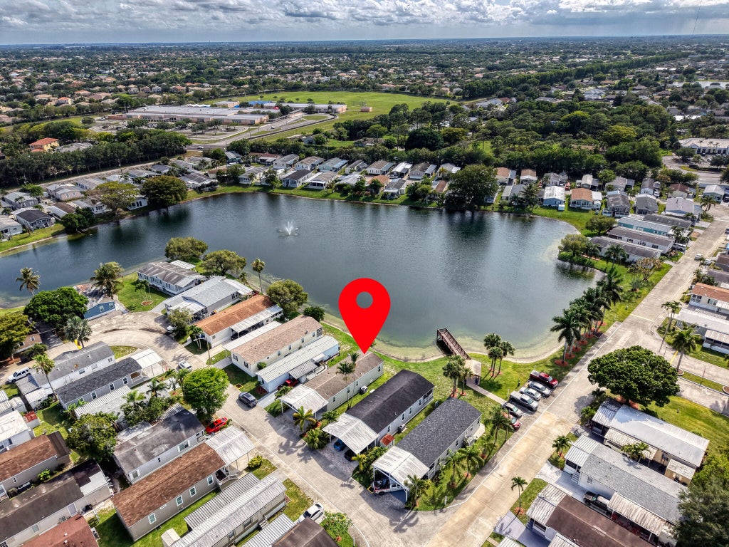 Photo of 164 Plantation Boulevard, Lake Worth, FL 33467 (MLS # B26023052)