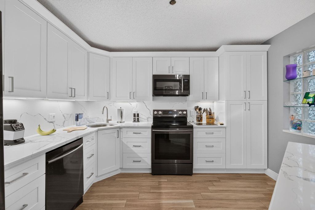 Photo of 5133 Brisata Circle #B, Boynton Beach, FL 33437 (MLS # B26045718)