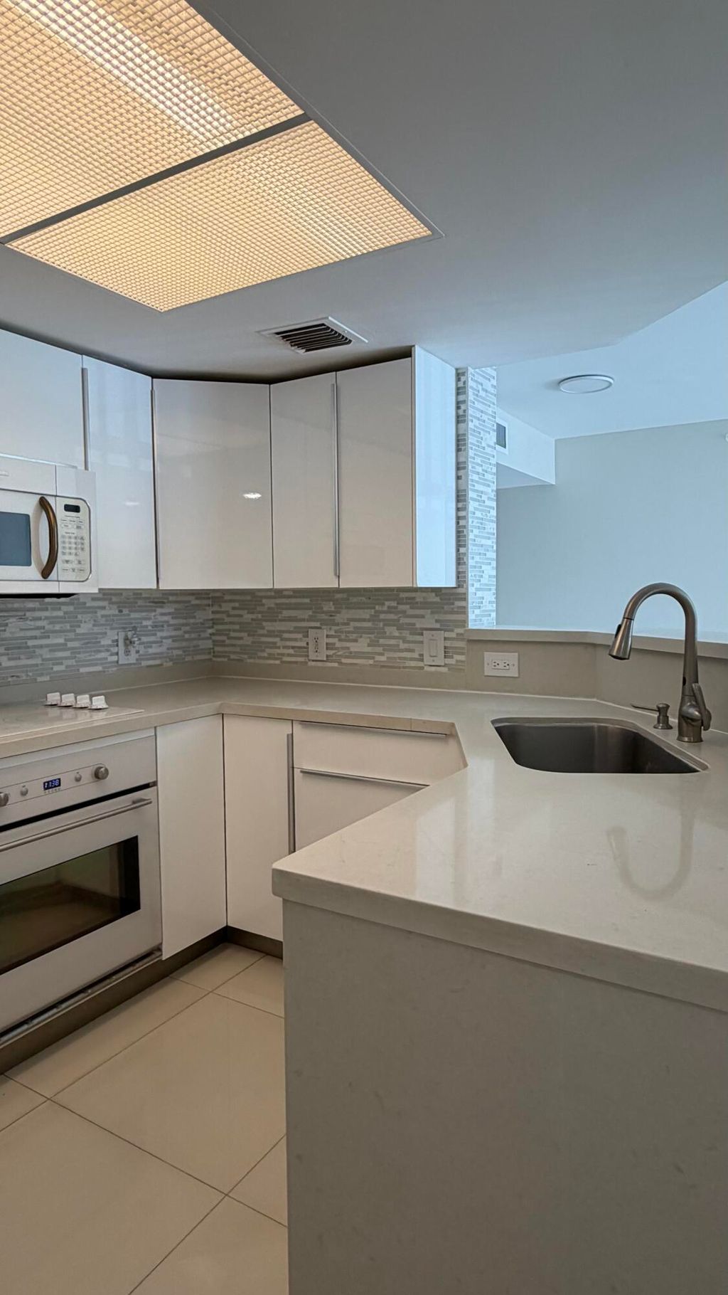 Photo of 5065 Wiles Road #207, Coconut Creek, FL 33073 (MLS # B26017470)