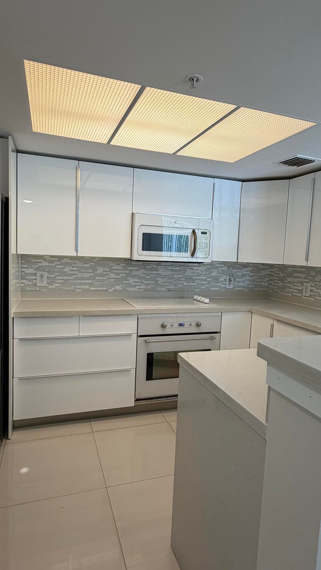 Photo of 5065 Wiles Road #207, Coconut Creek, FL 33073 (MLS # B26017470)