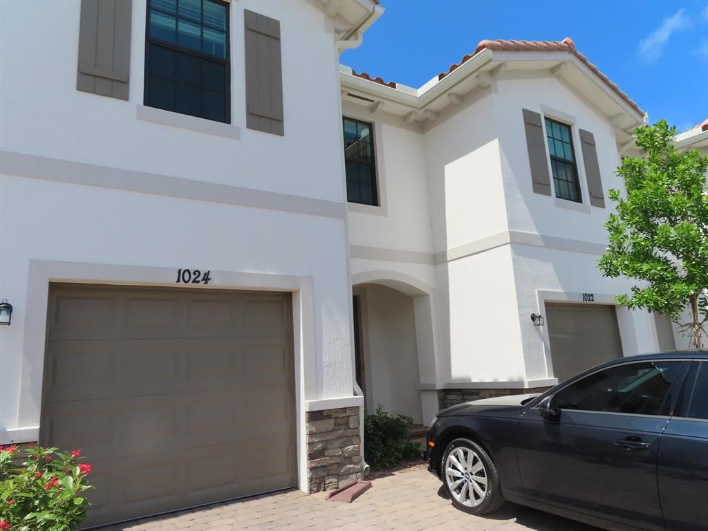 Photo of 1024 Sweet Briar Lane, Riviera Beach, FL 33410 (MLS # R10818618)