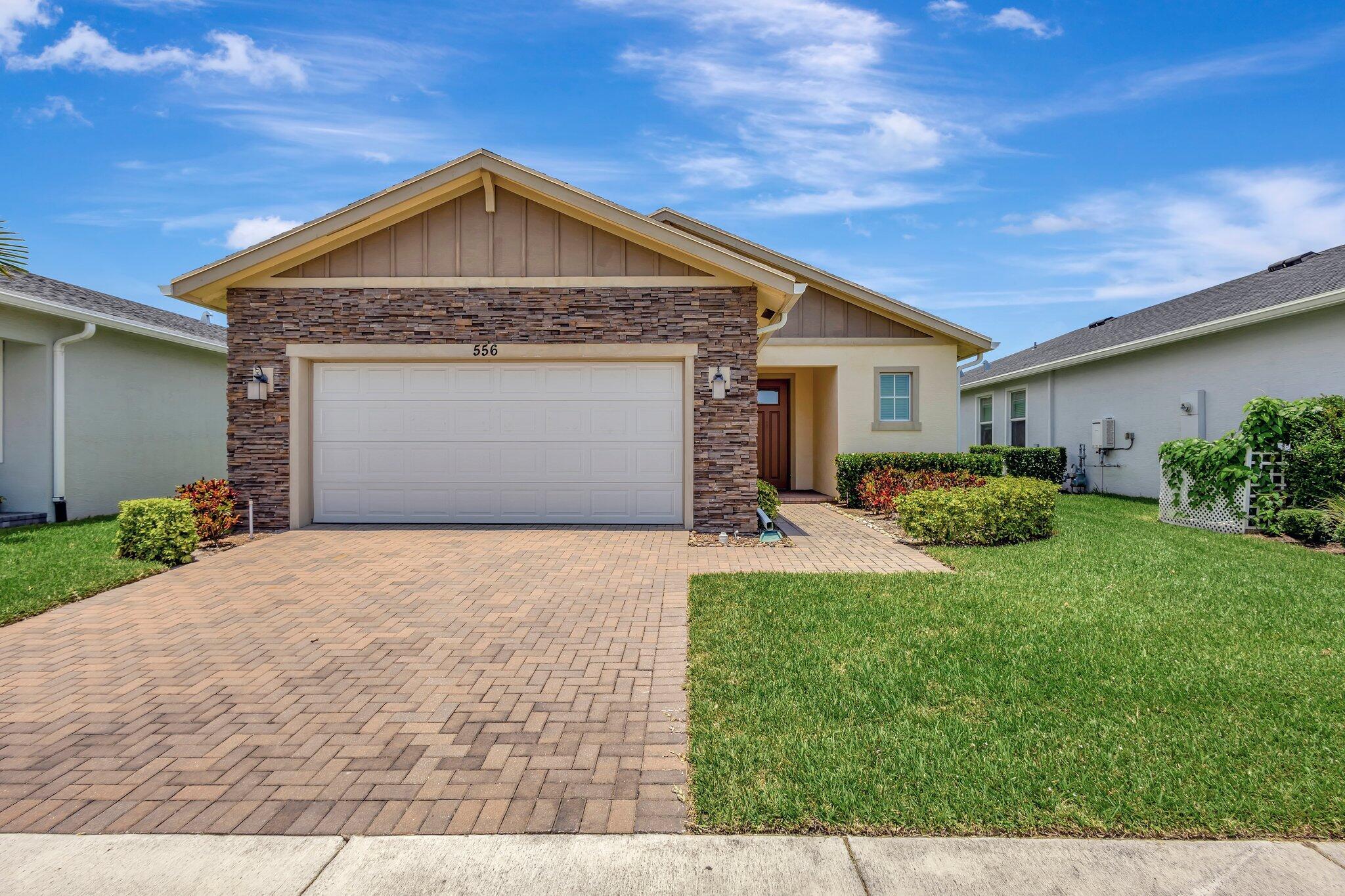 Immaculately maintained 2-bedroom, 2-bath home located in a sought-after resort style 55+ community. This move-in-ready property features tile flooring throughout, impact windows, and a screened-in lanai, perfect for outdoor relaxation. The kitchen is equipped with sleek quartz countertops, stainless steel appliances, and overlooks the open living and dining areas. The master suite includes a double-sink vanity and spacious shower. Enjoy access to a wide range of community amenities including a clubhouse with social activities, fitness center, pool, and theater room. Convenient, low-maintenance living at its finest! Don't miss this opportunity to own a beautiful home in a vibrant, amenity-rich community with a low HOA!