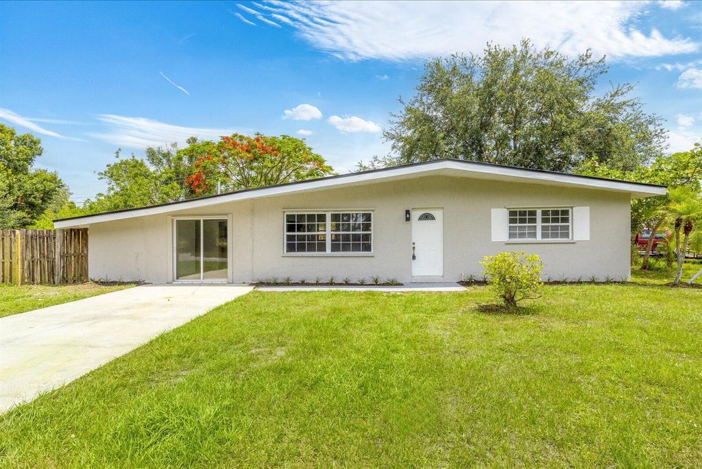 Photo of 7802 Miramar Avenue, Fort Pierce, FL 34951 (MLS # R11094305)