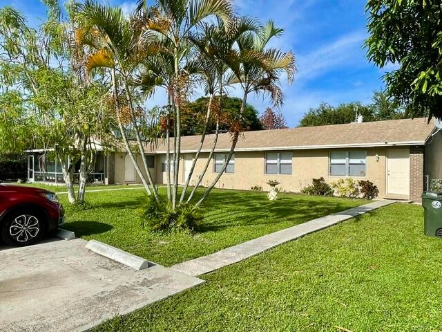 Photo of 424 Jennings Avenue, Greenacres, FL 33463 (MLS # B26066253)
