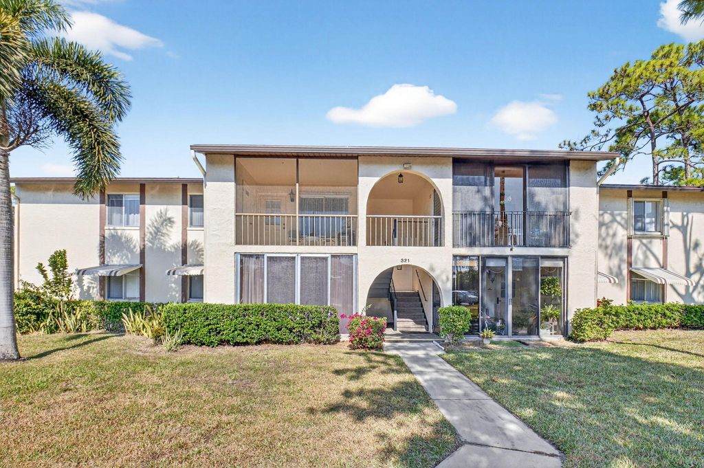 Photo of 321 Knotty Pine Circle #C-2, Greenacres, FL 33463 (MLS # R11164018)