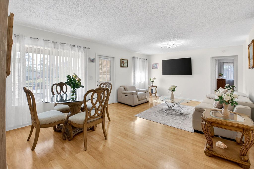 Photo of 321 Knotty Pine Circle #C-2, Greenacres, FL 33463 (MLS # R11164018)