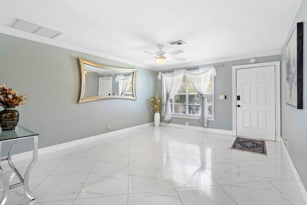 Photo of 1837 16th Avenue N, Lake Worth Beach, FL 33460 (MLS # R11164001)