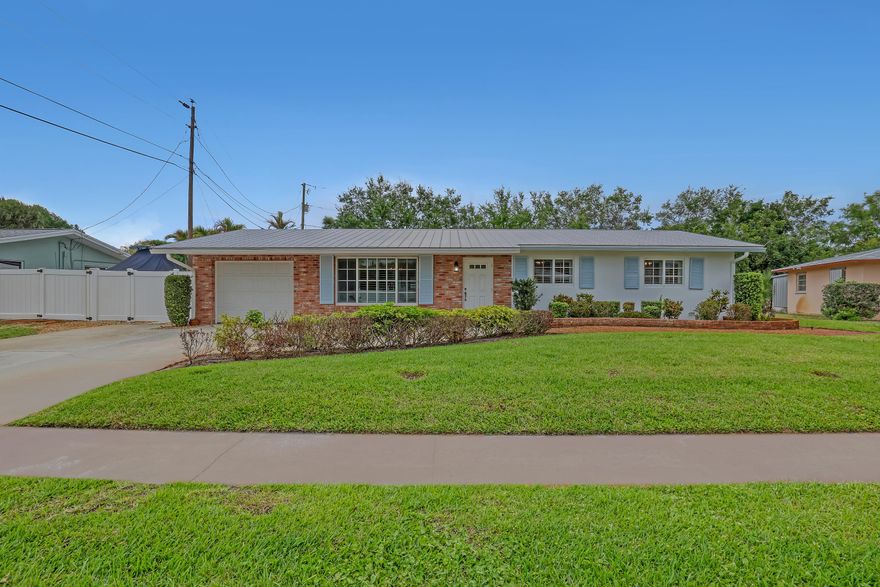 Welcome home to this fabulous original DiVosta residence in the heart of Tequesta. Pride of ownership is evident throughout, as the original owner has lovingly maintained this charming and well-cared-for home.  This inviting property features metal roof, impact glass windows, garage, 3 bedrooms w/ 2 full baths. The kitchen showcases newer s/s appliances along with the home's original solid wood cabinetry, offering timeless character and craftsmanship. Step outside to enjoy the fully fenced yard, perfect for pets, entertaining, or relaxing in privacy. Ideally located, you can walk to local shops restaurants, while the ocean beaches are just a couple miles away. Whether you're looking for a perfect starter home, an investment with tremendous potential, Or a place to enjoy as-is, This property offers the opportunity to appreciate its authentic charm and original craftsmanship in one of Tequesta's most desirable locations.
