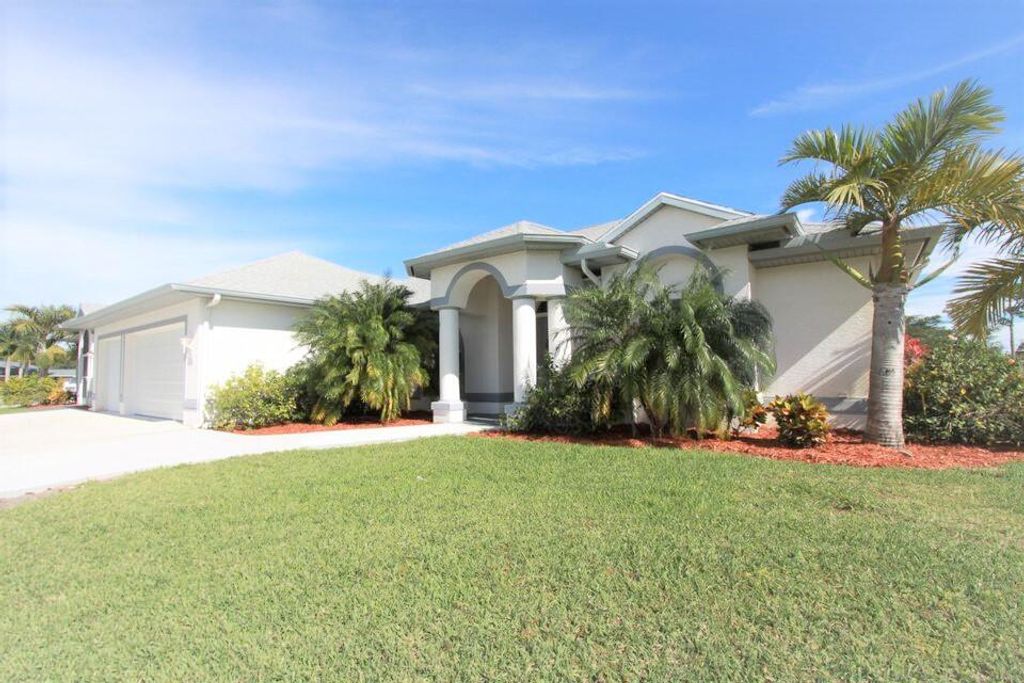 Photo of 2031 SE Elmhurst Road, Port Saint Lucie, FL 34952 (MLS # R10799189)