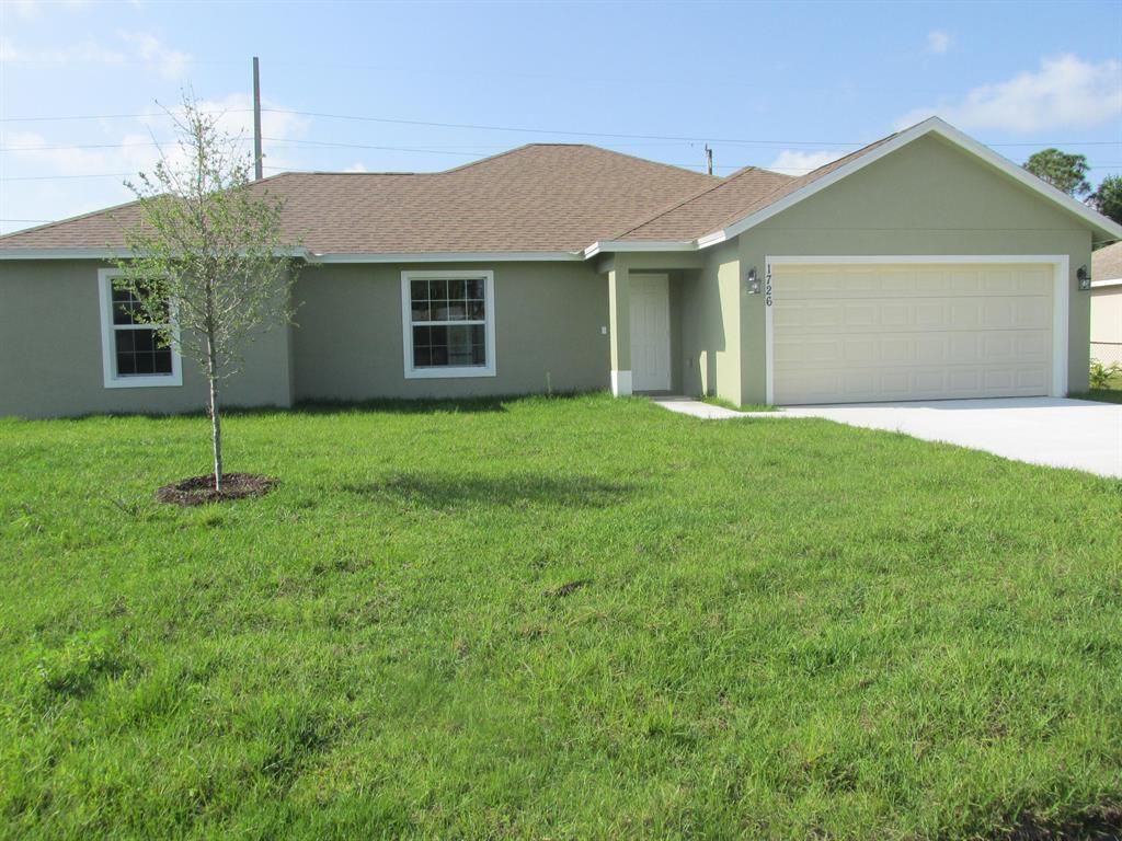 Photo of 1726 SE Minorca Avenue, Port St Lucie, FL 34952 (MLS # R10892445)