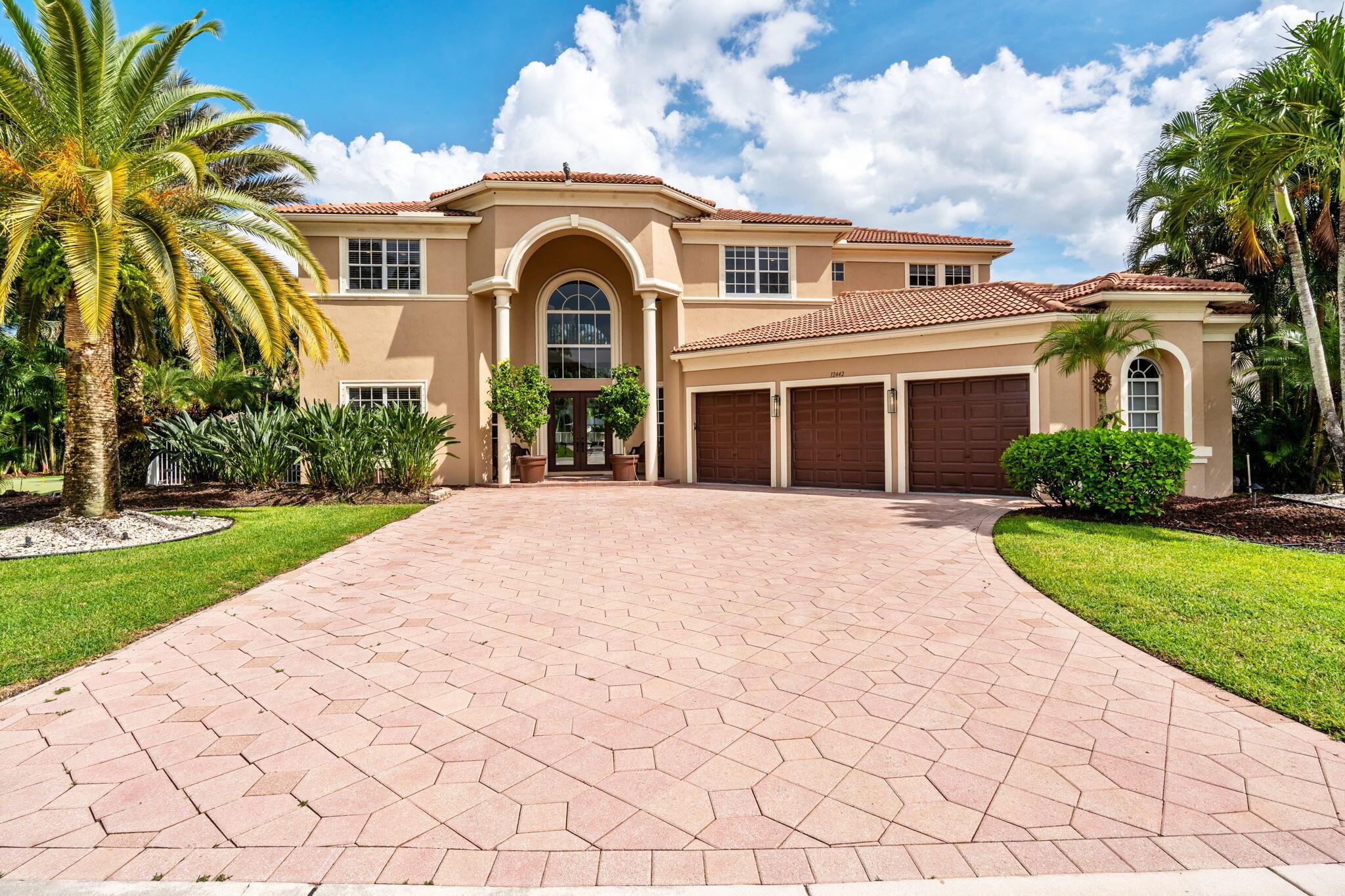 Welcome to this beautiful light-filled 6-bedroom, 4.5-bath seasonal rental offering luxurious comfort, space, and style. Upon entering, a striking floor-to-ceiling rear window greets you, framing the backyard, resort-style pool, and water, filling the home with light and serenity, with abundant space and storage throughout. The first floor features wood-tile flooring, a guest suite with a cabana bath and pool access, and flexible living and dining areas perfect for entertaining. The open family room and breakfast nook flow seamlessly into the gourmet kitchen with a 5-burner double oven, oversized island, walk-in pantry, and backsplash windows that bring in even more natural light.