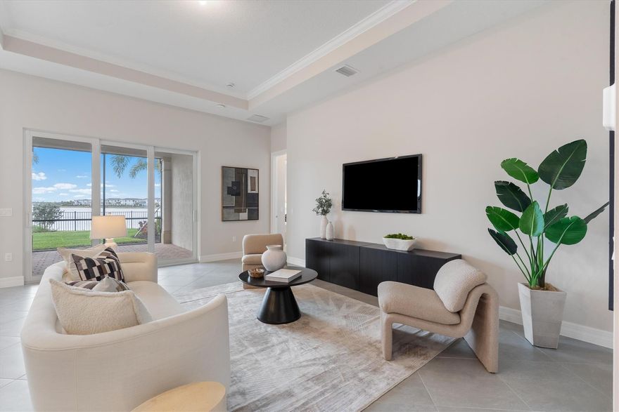 Welcome to a rarely available new construction waterfront home in the sought-after gated Avenir community of Palm Beach Gardens. Built in 2024, never lived in, this pristine residence offers 3 bedrooms, 2.5 baths, and 2,114 sq ft of thoughtfully designed living space with panoramic lake views. Enjoy bright, open-concept living with expansive ceilings and abundant natural light from south-facing windows. The elegant white shaker kitchen features quartz countertops, a large pantry, and premium finishes. Relax on your screened lanai overlooking serene water views, perfect for morning coffee or sunsets. Additional highlights include a built-in laundry room with utility sink, 2-car garage, and access to Avenir’s clubhouse, pool, and tennis courts.