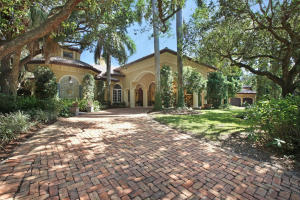 MAGNIFICENT CUSTOM LAKEFRONT ESTATE SITED ON A LUSHLY LANDSCAPED, TRANQUIL WATERFRONT 1.1 +/- ACRE LOT, W/6 BR'S, 7 BATHS PLUS LIBRARY. DESIGNED BY RENOWNED ARCHITECT SHANE AMES COMBINING OLD WORLD SOPHISTICATION WITH CASUAL SOUTH FLORIDA ELEGANCE. CHICAGO BRICK DRIVEWAY LEADS TO A GRAND PORTICO & MASSIVE MAHOGONY DOUBLE DOOR ENTRY. IMPACT GLASS WINDOWS W/CUSTOM IRONWORK ADD TO THE OLD WORLD CHARM. INTERIOR FINISHES OF THE HIGHEST CALIBER INCLUDE MARBLE & WOOD FLOORING, MARBLE, GRANITE & JERUSALEM STONE COUNTER TOPS, CUSTOM BUILT-INS & TOP-OF-THE-LINE APPLIANCES (6-BURNER THERMADOR GAS STOVE, THERMADOR DOUBLE OVENS, 2 BOSCH DISHWASHERS). THE RESORT-STYLE POOL W/SALT WATER FILTRATION & PAVERED PATIO OVERLOOKS THE SERENE LAKE & INCLUDES A COVERED SUMMER KITCHEN W/LARGE BAR AREA AND...