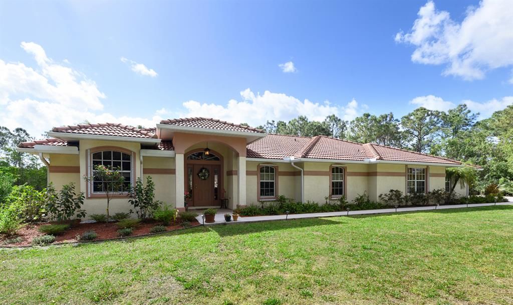 Photo of 2705 SE Ranch Acres Circle, Jupiter, FL 33478 (MLS # R10698332)