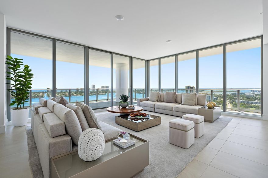 Experience brand-new luxury waterfront living at Nautilus 220. This residence offers sweeping Intracoastal and Atlantic Ocean views through floor-to-ceiling glass. The open-concept layout features  private terraces ideal for enjoying stunning sunrises and seamless indoor-outdoor living. Interior finishes include Miele appliances, European cabinetry, a waterfall quartz island, and a private elevator lobby. Residents enjoy resort-style amenities including a private beach club on Singer Island and waterfront dining at SeaHawk Prime by David Burke. The expansive amenity collection includes multiple pools, a rooftop lap pool and spa, state-of-the-art fitness center, yoga and spin studios, sauna and steam rooms, golf and sports simulator, bowling, theater, club room, concierge, valet, and more.