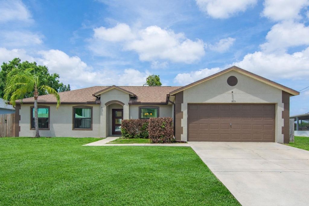 Photo of 825 SW Koler Avenue, Port Saint Lucie, FL 34953 (MLS # B26015699)