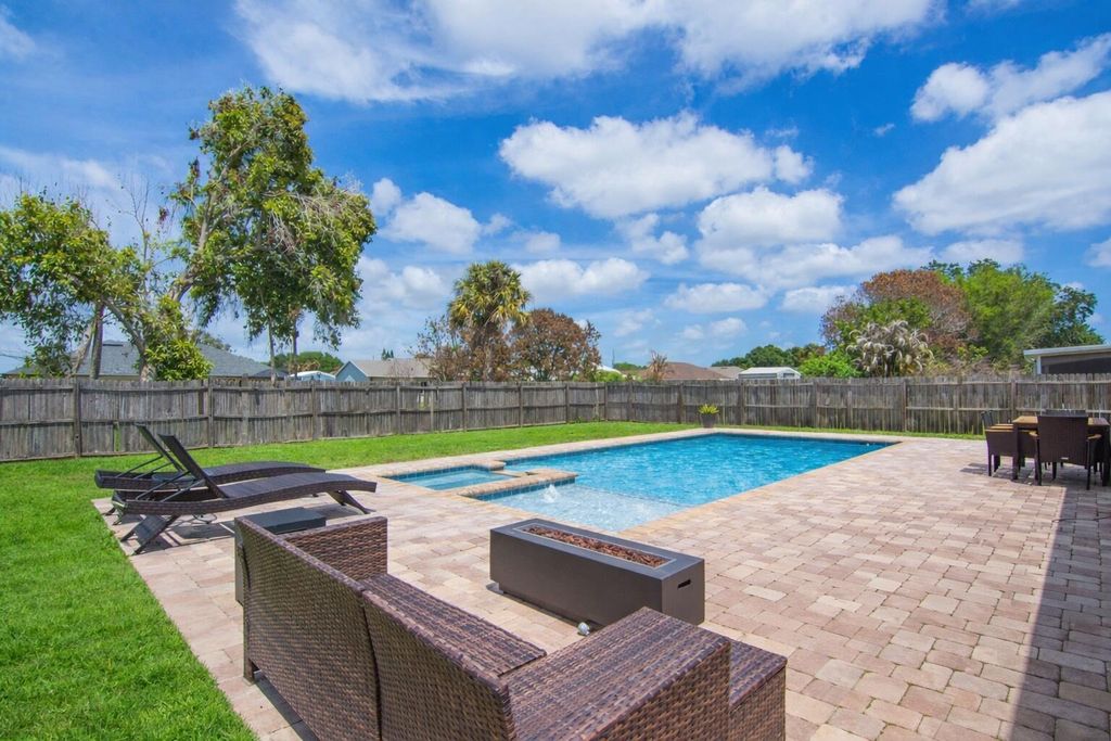 Photo of 825 SW Koler Avenue, Port Saint Lucie, FL 34953 (MLS # B26015699)