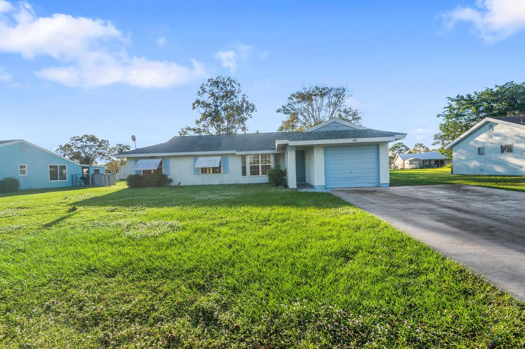 Photo of 3074 SW Denton Street, Port St Lucie, FL 34953 (MLS # R10848243)