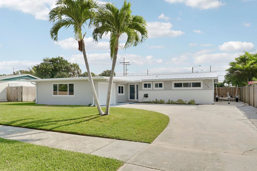 Photo of 636 Eastwind Drive, North Palm Beach, FL 33408 (MLS # B26007758)