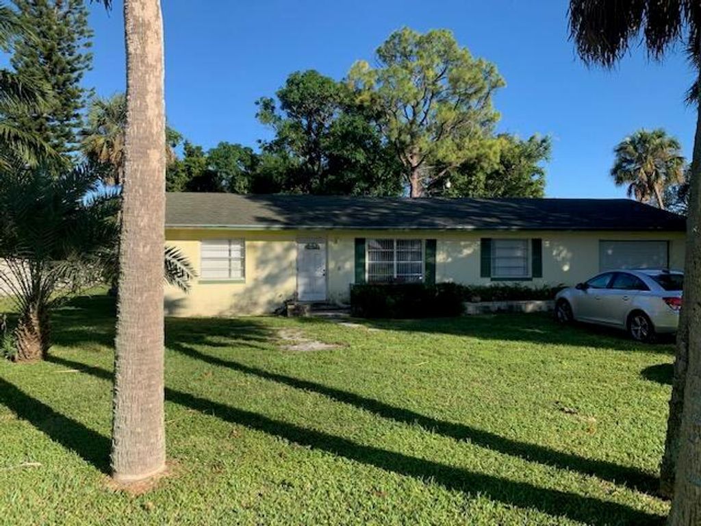 Photo of 216 Henning Drive, West Palm Beach, FL 33406 (MLS # R10757788)