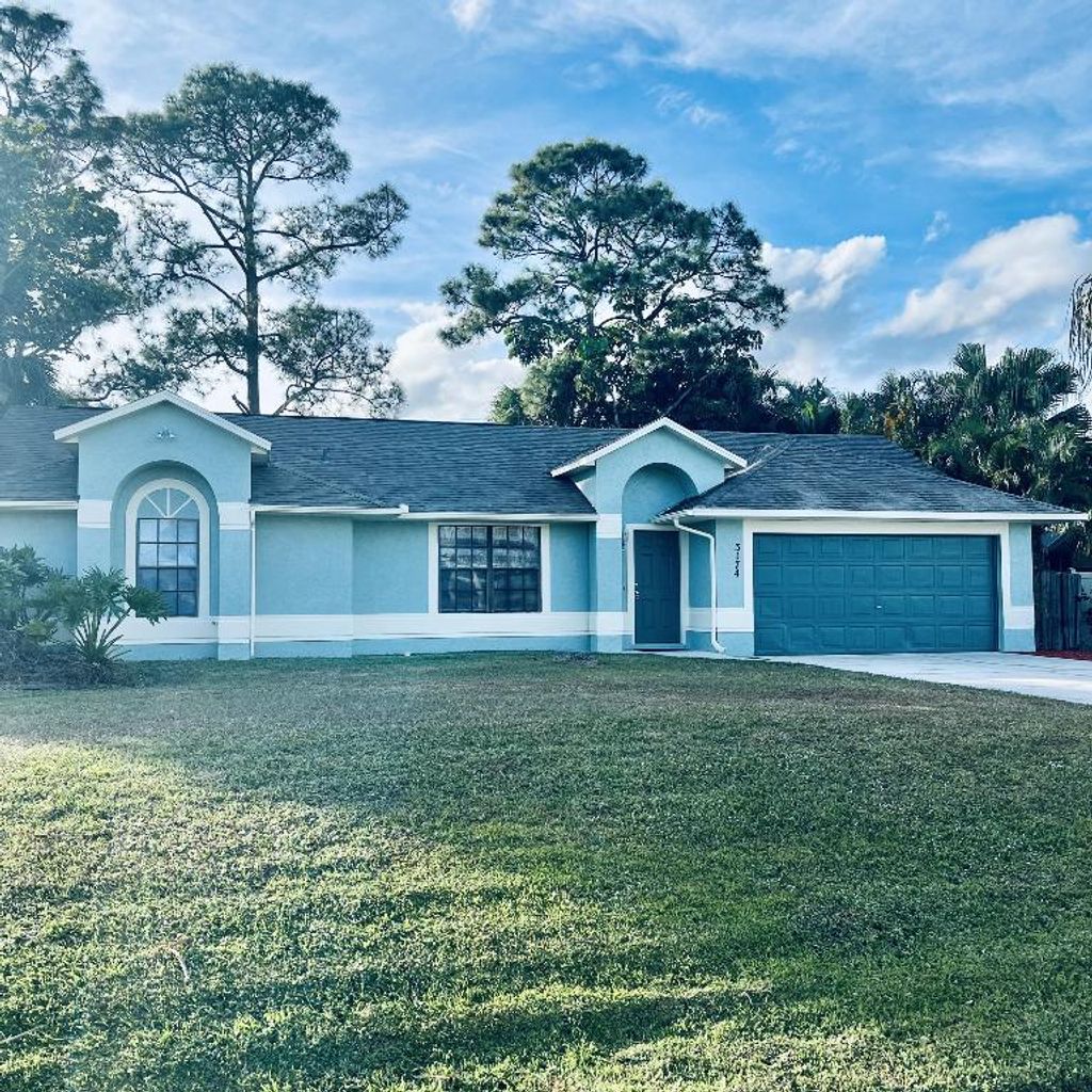 Photo of 3174 SW Armucher Street, Port Saint Lucie, FL 34953 (MLS # R11142472)