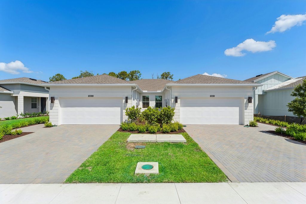 Photo of 10091 NW Dreamweaver Road #52, Port Saint Lucie, FL 34987 (MLS # R11159000)