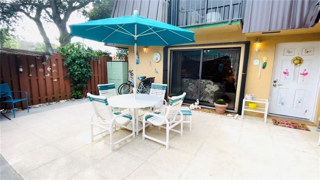 Photo of 6395 SE Windsong Ln #133, Stuart, FL 34997 (MLS # F10311940)