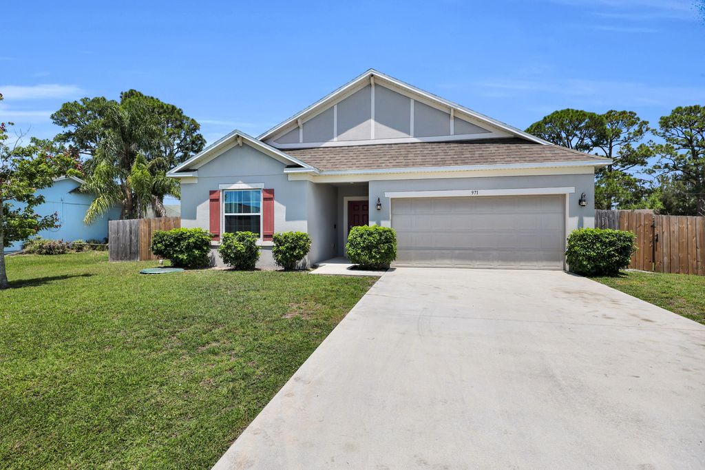 Photo of 971 SW Longfellow Road, Port Saint Lucie, FL 34953 (MLS # B26026657)