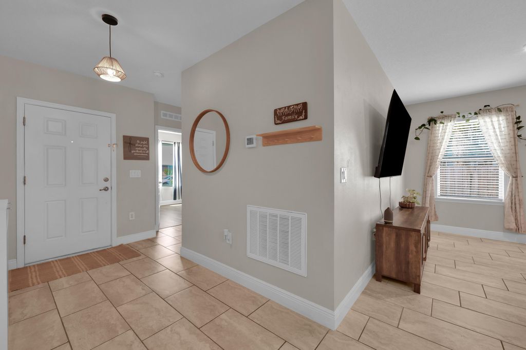 Photo of 971 SW Longfellow Road, Port Saint Lucie, FL 34953 (MLS # B26026657)