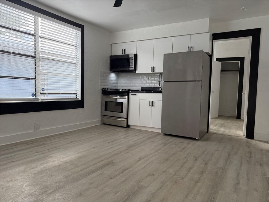 Come see this charming, fully renovated 1-bedroom, 1-bath apartment in a prime location just blocks from Downtown Hollywood! Featuring modern finishes throughout, this unit boasts stainless steel appliances, including a sleek electric stove, refrigerator, and microwave in the kitchen. Kitchen cabinets and bathroom cabinets come with soft closing hardware. The open living space has beautiful natural light from large windows with blinds. The bathroom is updated with a stylish tiled shower and contemporary fixtures. Enjoy new flooring throughout the living room and bedroom. There is washer and dryer on premises. This unit won’t last long—schedule your viewing today!