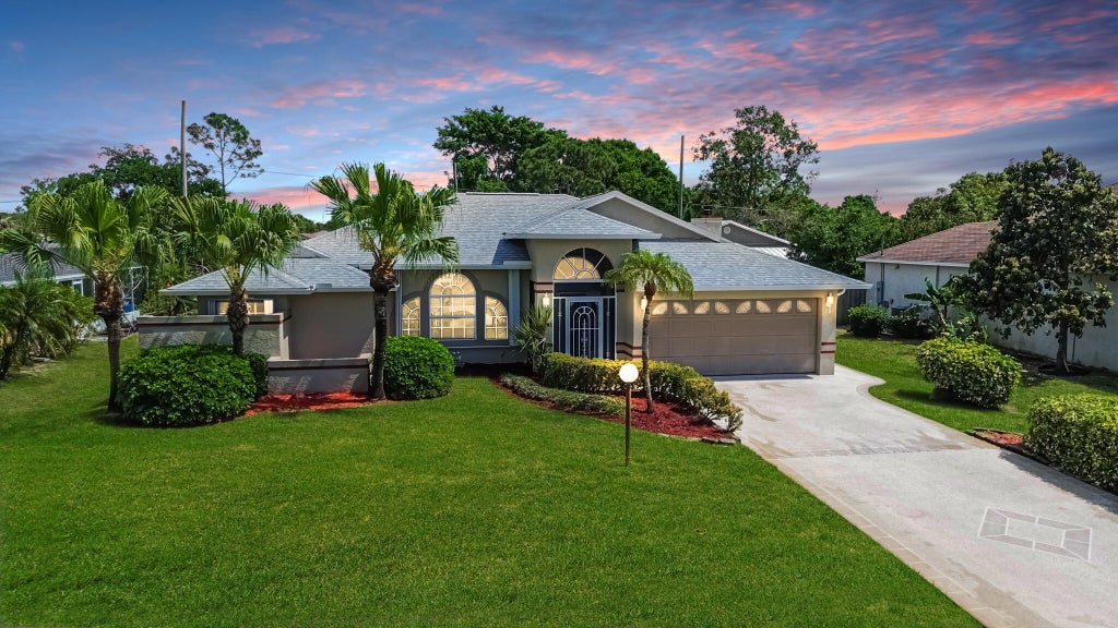 Photo of 2461 SW Cameo Boulevard, Port Saint Lucie, FL 34953 (MLS # R11075926)