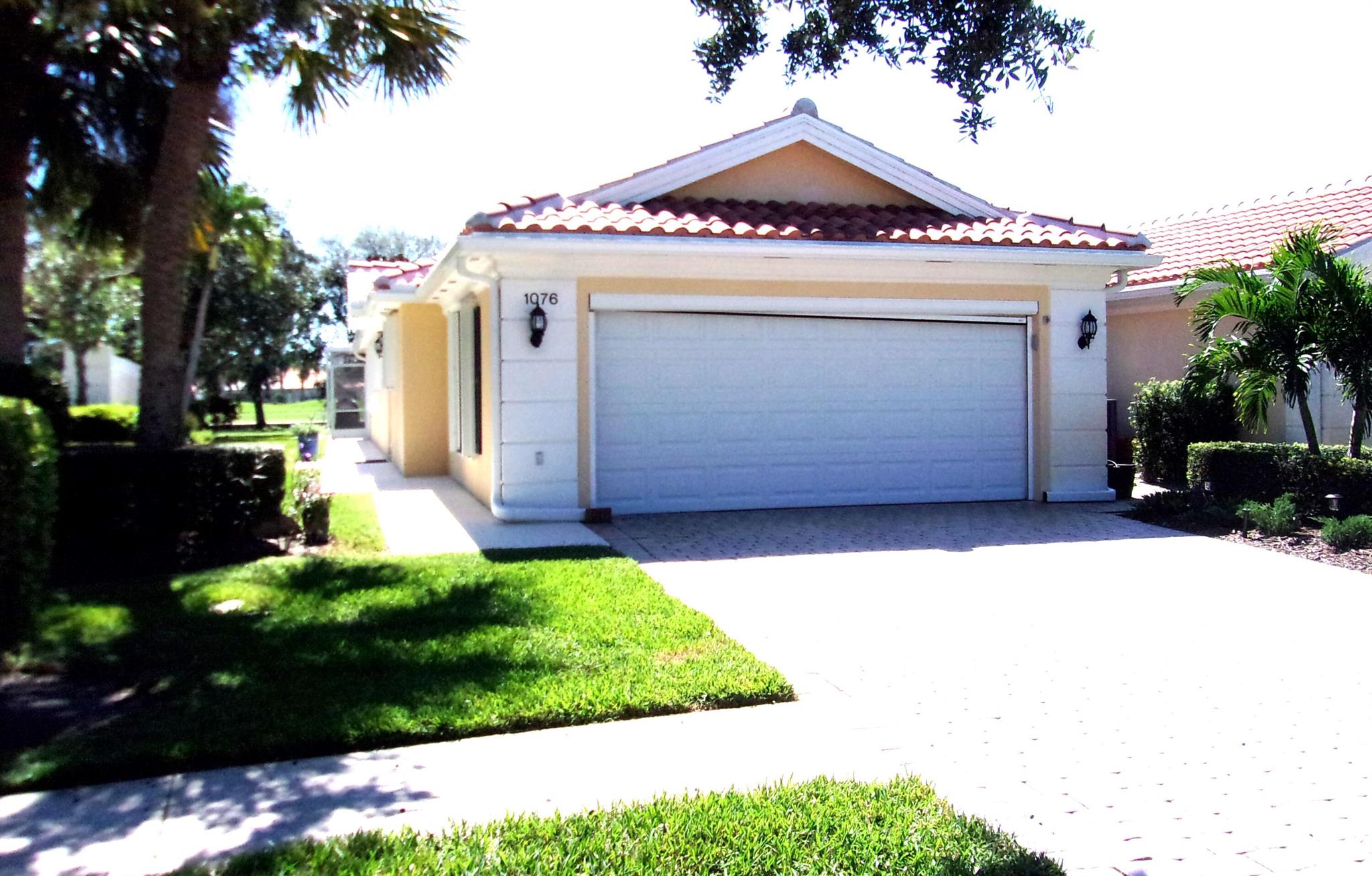 Owner has spared no expense in renovating this extended Capri floor plan in The Florida Club. Available for rent starting December 2023. Light, bright, and extreme comfort awaits you in this open floor plan from the kitchen through the great room, dining room and den. Bedroom suites are at each end of the villa with private bathrooms and a dedicated office area in the Primary suite. Wonderful views of the lake & golf couse from the screened lanai and plenty of storage and 2 car attached garage give you everything you need for elite seasonal comfort just steps away from tennis/pickleball courts, pool and community room. Come and embrace the lush landscape of The Florida Club with it's easy access to I-95, shopping, restaurants, and County parks. Renter's Insurance required. No smoking.