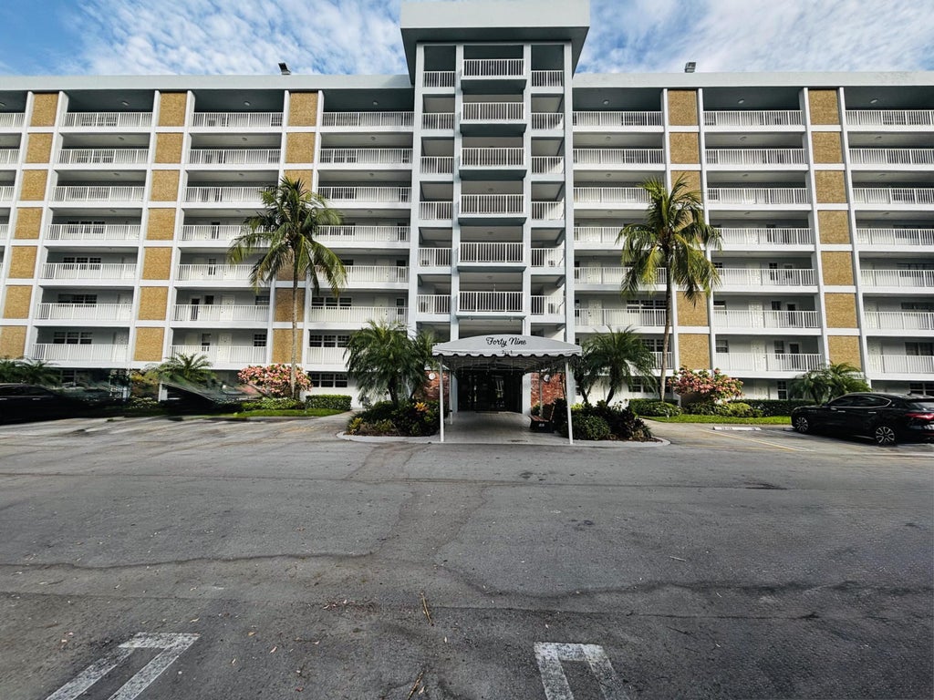 Photo of 3091 N COURSE Drive #710, Pompano Beach, FL 33069 (MLS # B26057375)