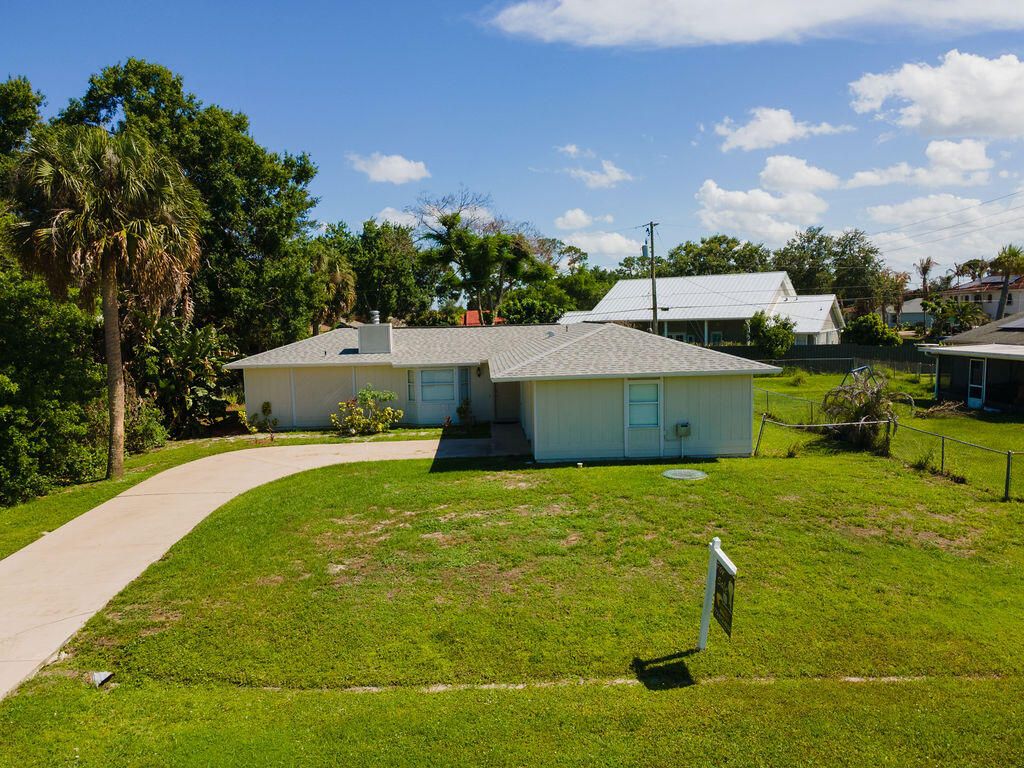 Photo of 1242 SW Parma Avenue, Port Saint Lucie, FL 34953 (MLS # B26032226)