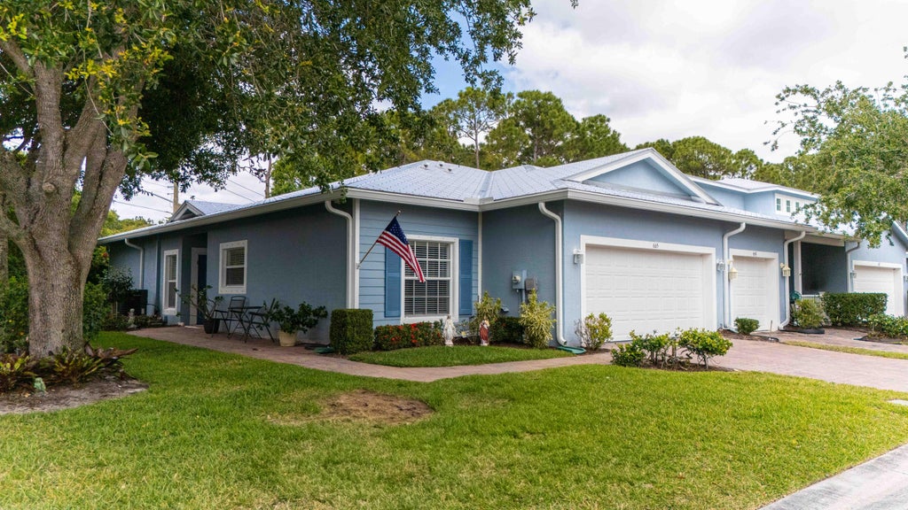 Photo of 665 NE Bent Paddle Lane, Port Saint Lucie, FL 34983 (MLS # R11084055)