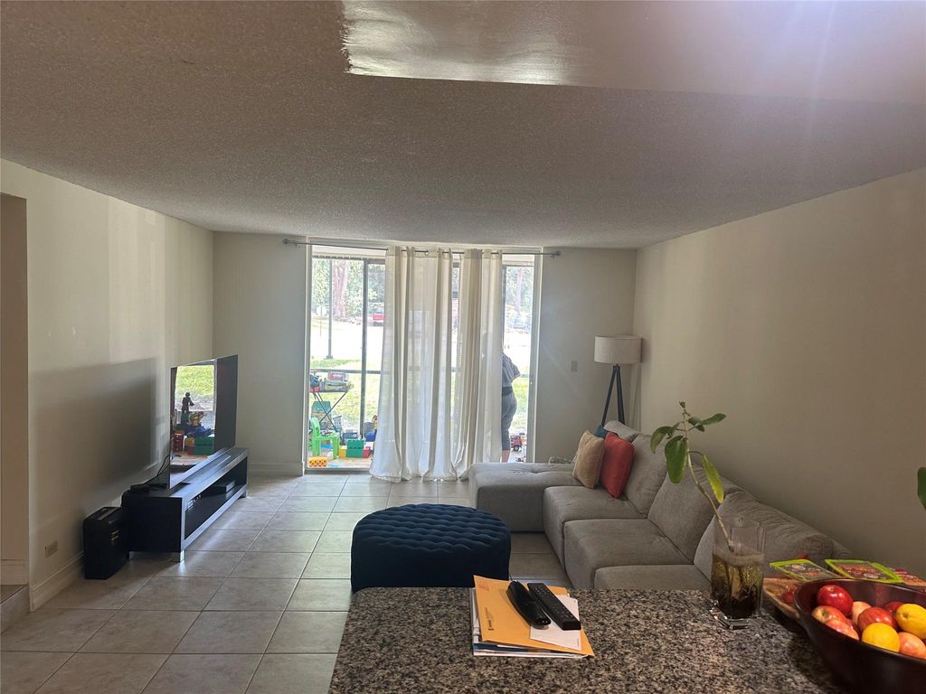 Photo of 3740 Inverrary Drive #1c, Lauderhill, FL 33319 (MLS # F10495713)