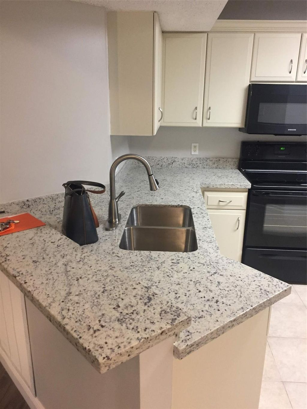 Photo of 8721 Wiles Rd #102, Coral Springs, FL 33067 (MLS # F10447064)